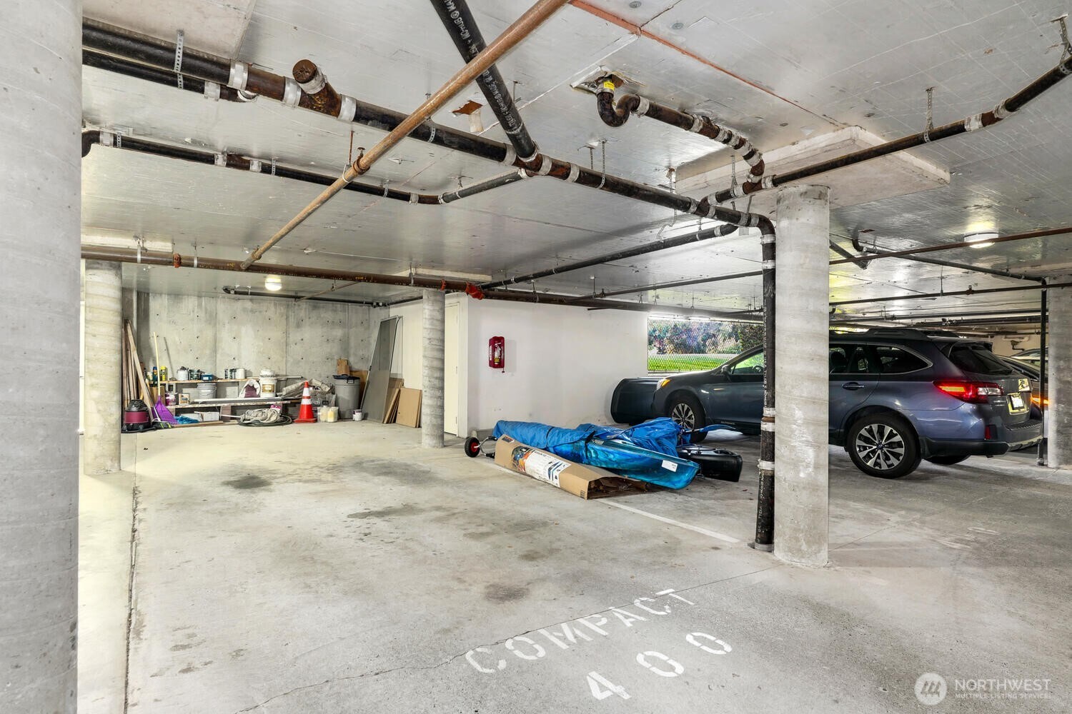 two side by side full parking spots in a secure garage