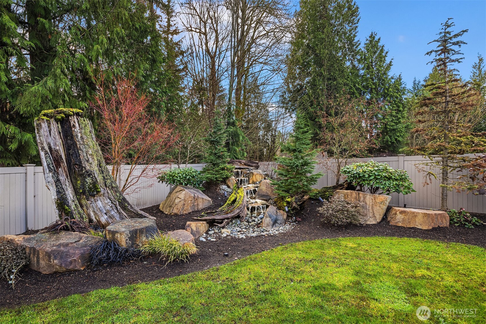 Professionally Landscaped with waterfall