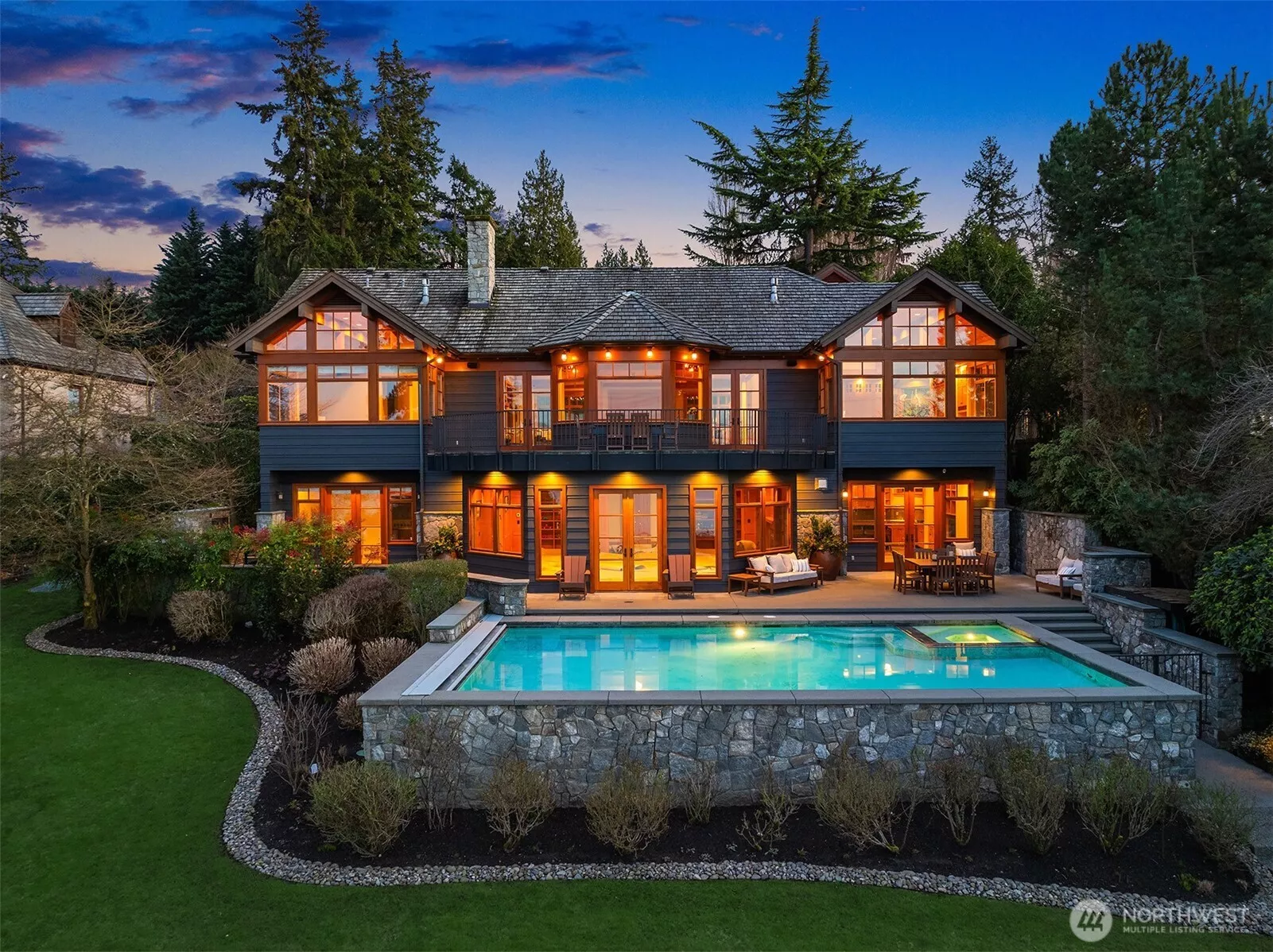 Welcome to an exquisite waterfront estate where timeless elegance meets modern luxury. Custom built with extraordinary craftsmanship and meticulous attention to detail, this peaceful retreat offers breathtaking panoramic views and an unrivaled waterfront lifestyle.