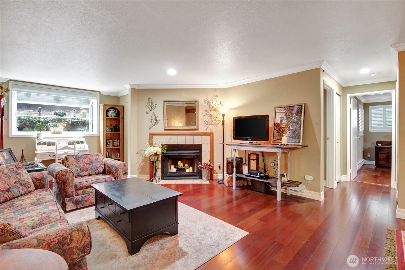 Wood fireplace gives the room a cozy feeling