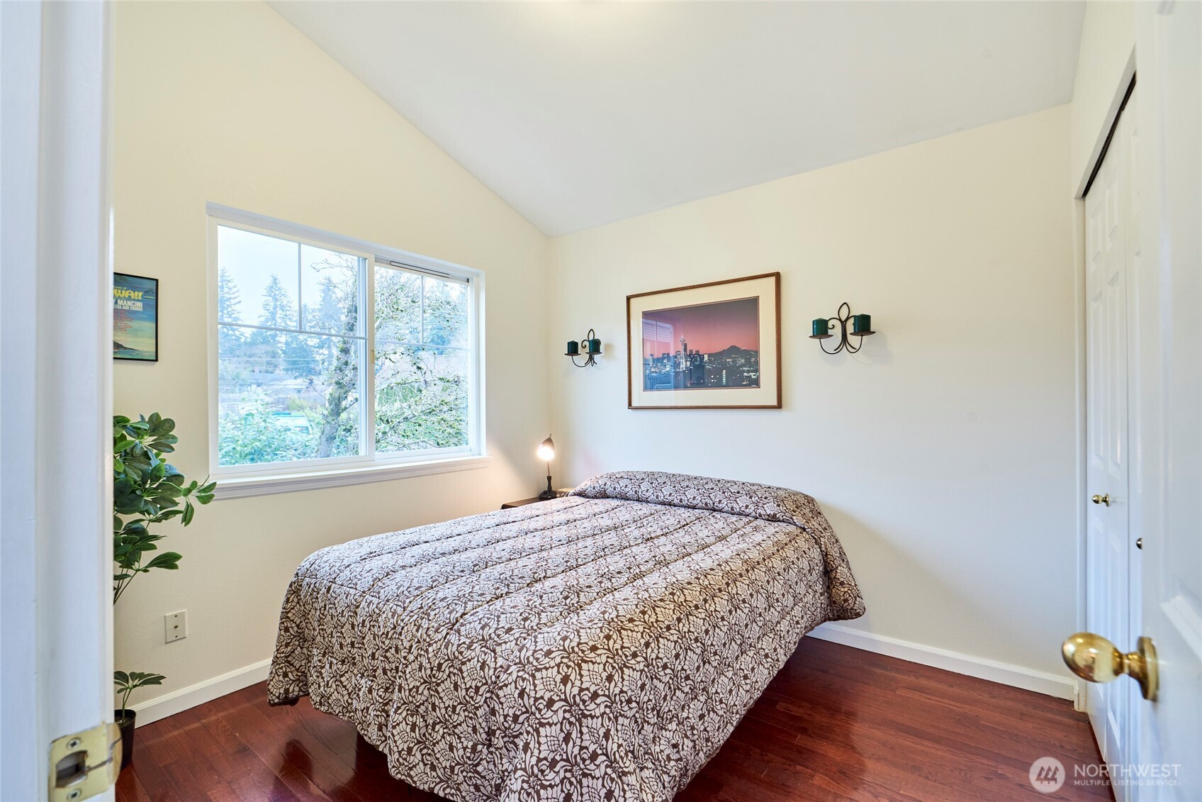 While not as large as the other bedroom, the second upstairs bedroom is large enough to sleep comfortably or use as a home office. It too has a large closet.