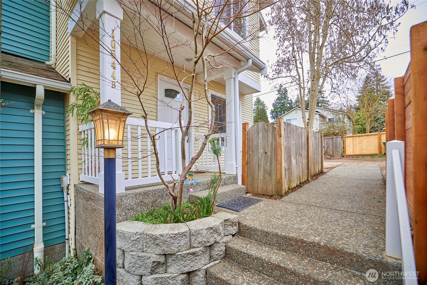 This darling end unit is the last home on the left in a courtyard community the promotes interaction with your neighbors. The assigned parking spot is close by, just off the alley.