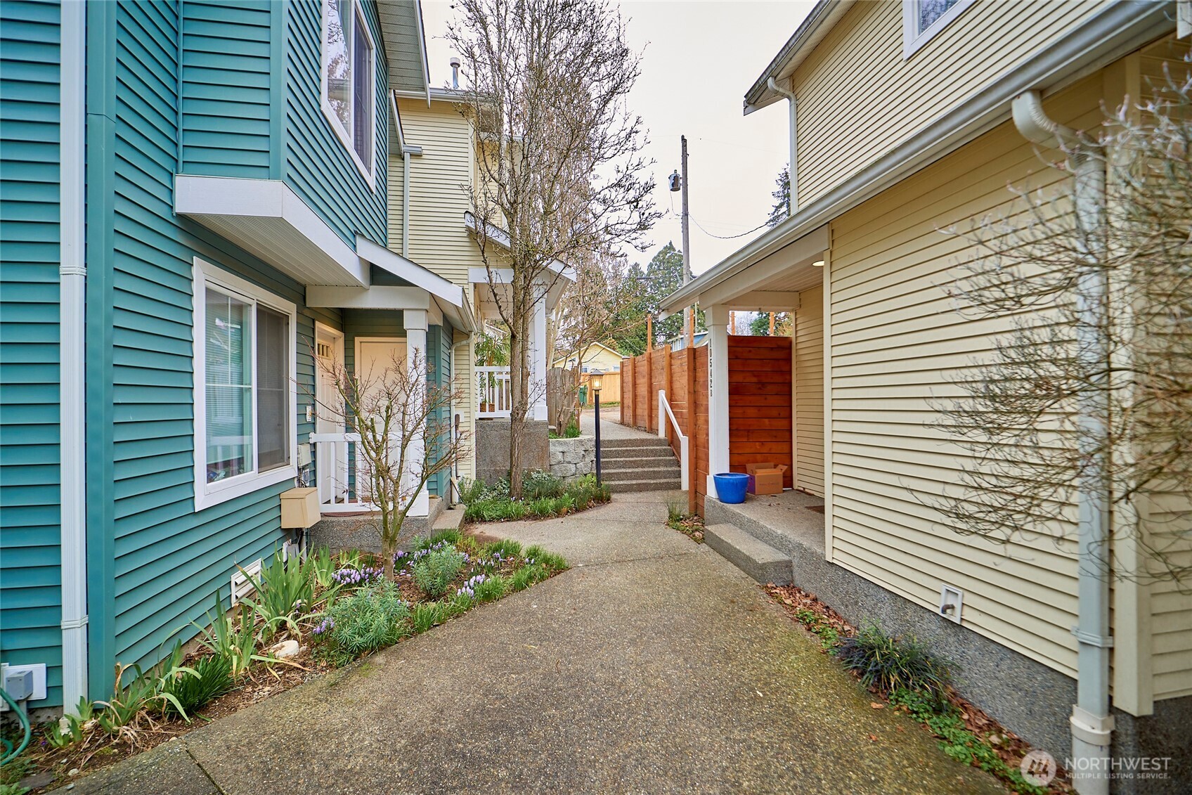 Another look at the courtyard approach to the unit. In a few weeks it will look even cuter when the flowers and trees start to bloom.