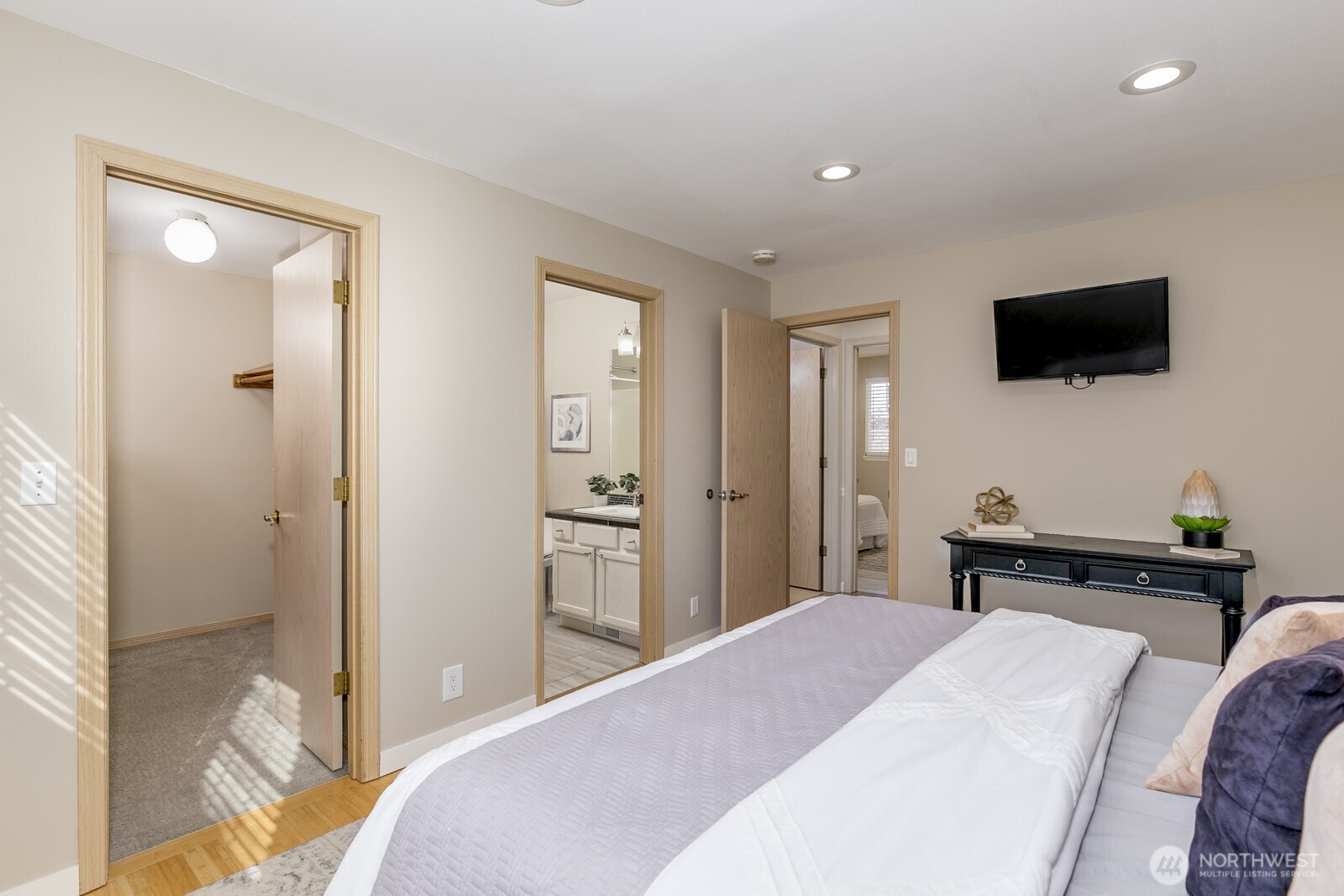 Upgraded Primary bath with beautiful ceramic tile floor and counters.  Plus, designer hardware and faucets.