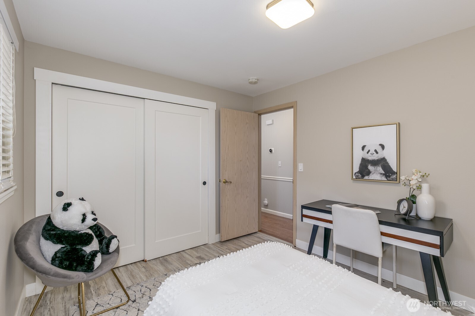 Full bathroom with ceramic tile counter and floor, plus upgraded hardware and faucets.