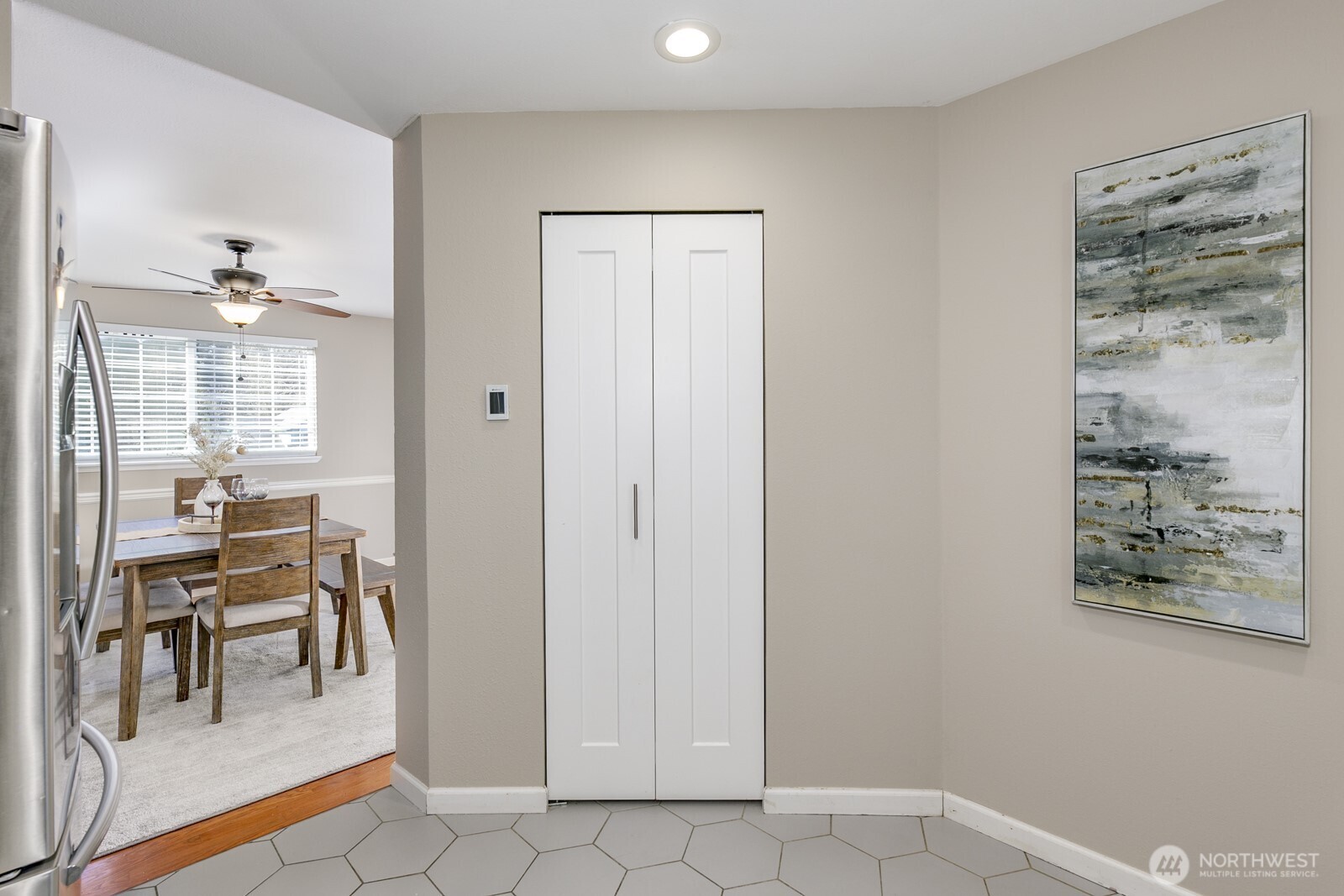 Delightful dining room leads to kitchen.