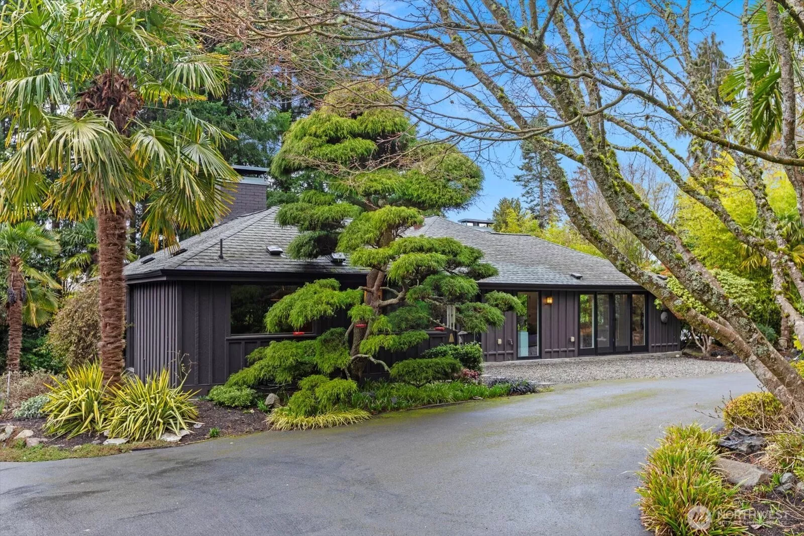 Graceful entry and circular driveway. Your sanctuary awaits.