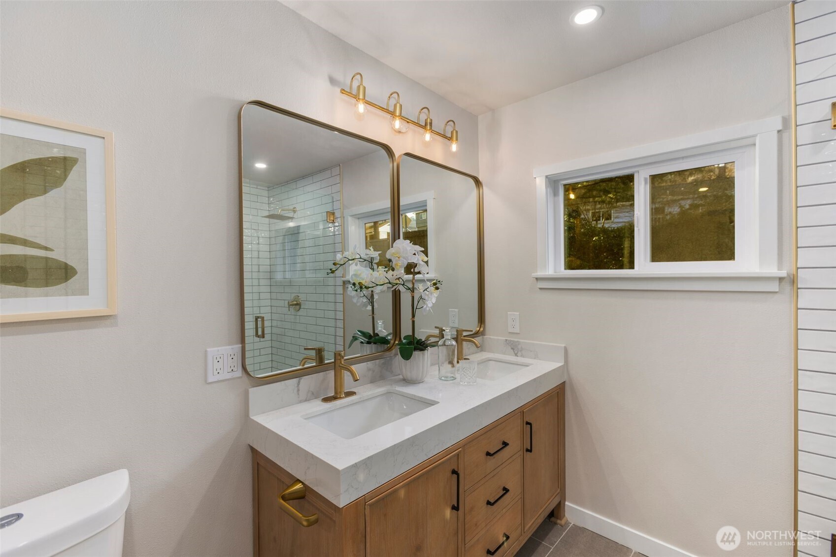 Primary bathroom w/ large walk-in closet.