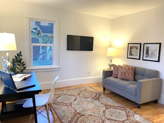 The front bedroom is set up as an office / den. A pull out sofa or a Murphy bed might be something to consider for this space if you want an separate office and occasionally have overnight guests.