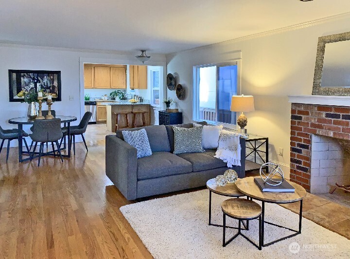 Open floor plan is great for entertaining. The cook can enjoy the guests and keep them out of the kitchen too. ;-) Wood burning brick fireplace was installed in 2008 and has never been used.