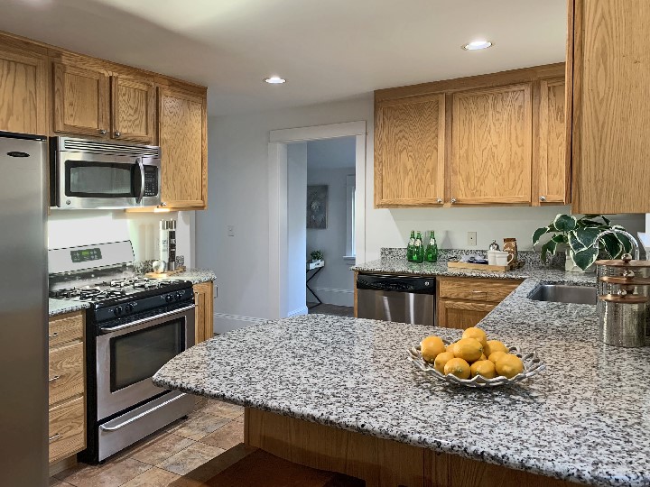 Look at all the counter space in this kitchen! Any chef or baker would love to have this area make meals, entertain, or baking. Extra large and deep stainless sink.