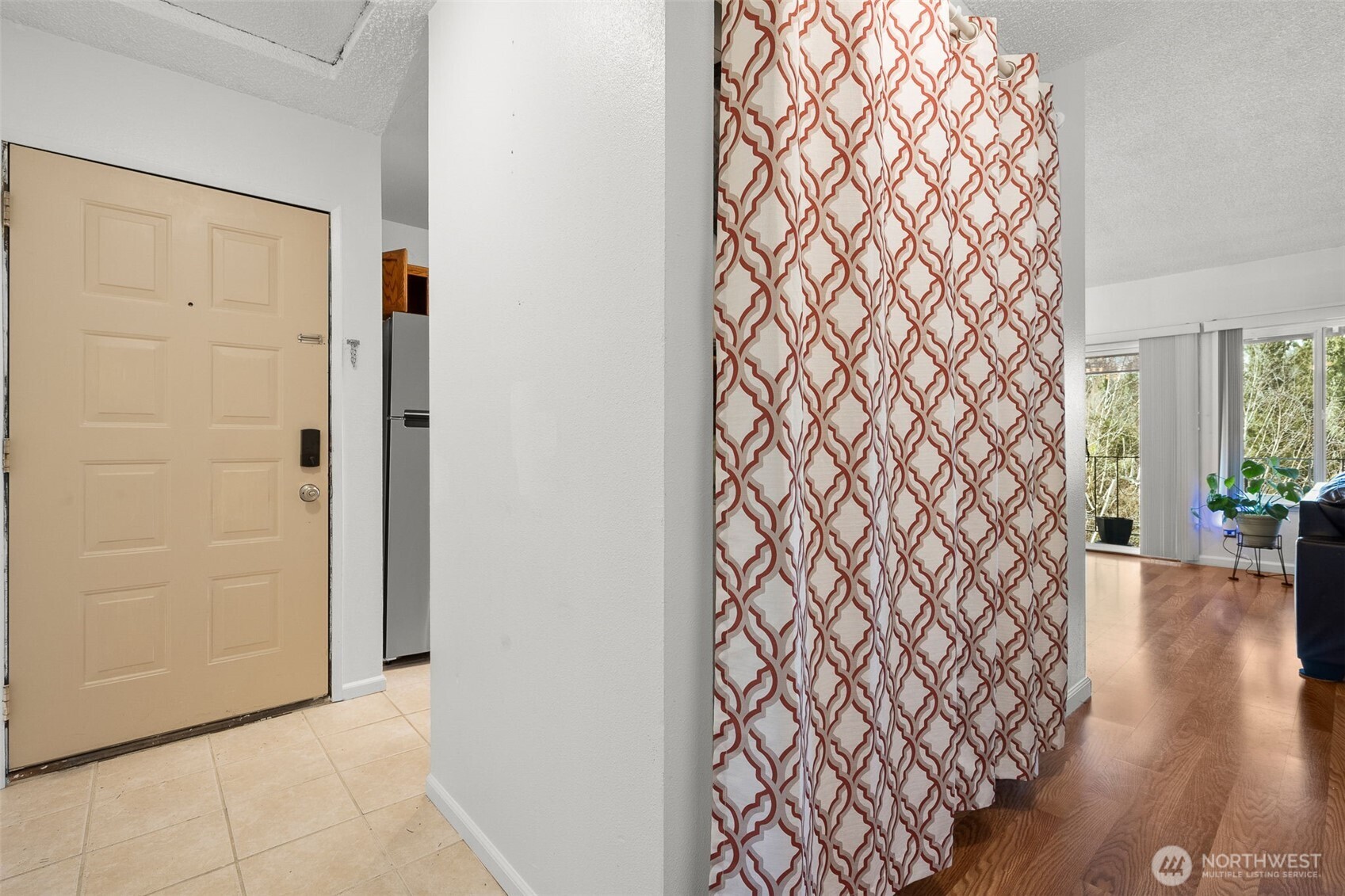 Hallway leading from bedrooms to front door and Kitchen