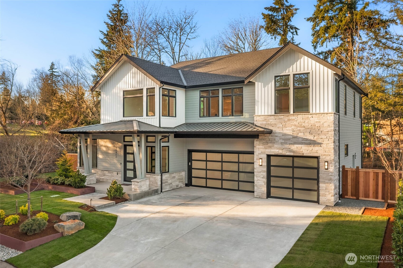 Extra large 3 car garage and large stamped concrete driveway