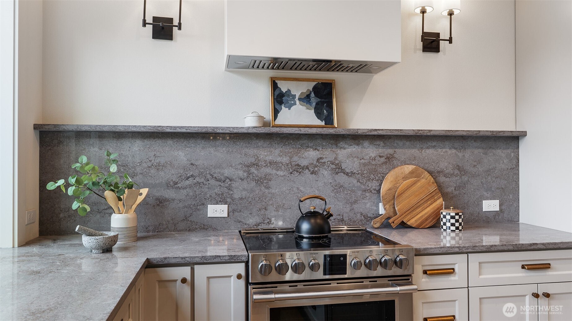 Kitchen has beautiful backsplash.