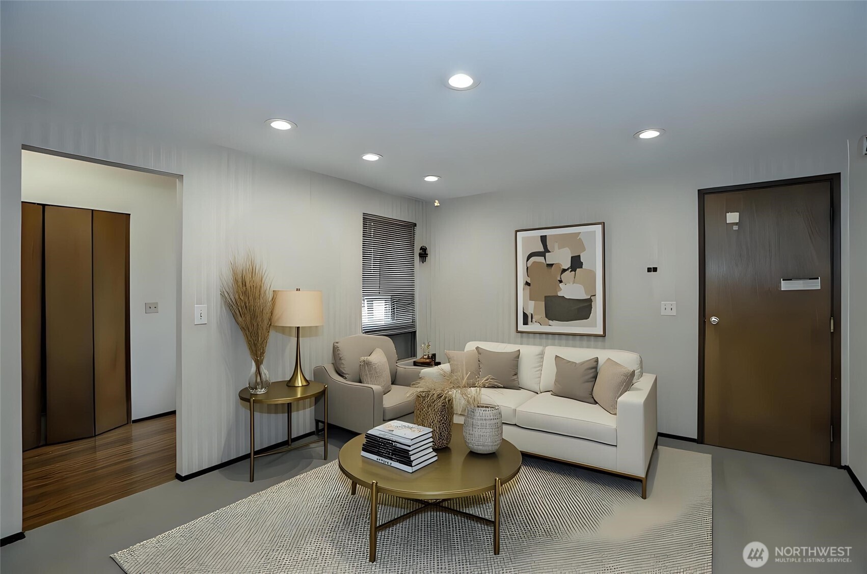 Additional view of the family room, with a door providing easy access to the spacious two-car garage - virtually staged for inspiration.