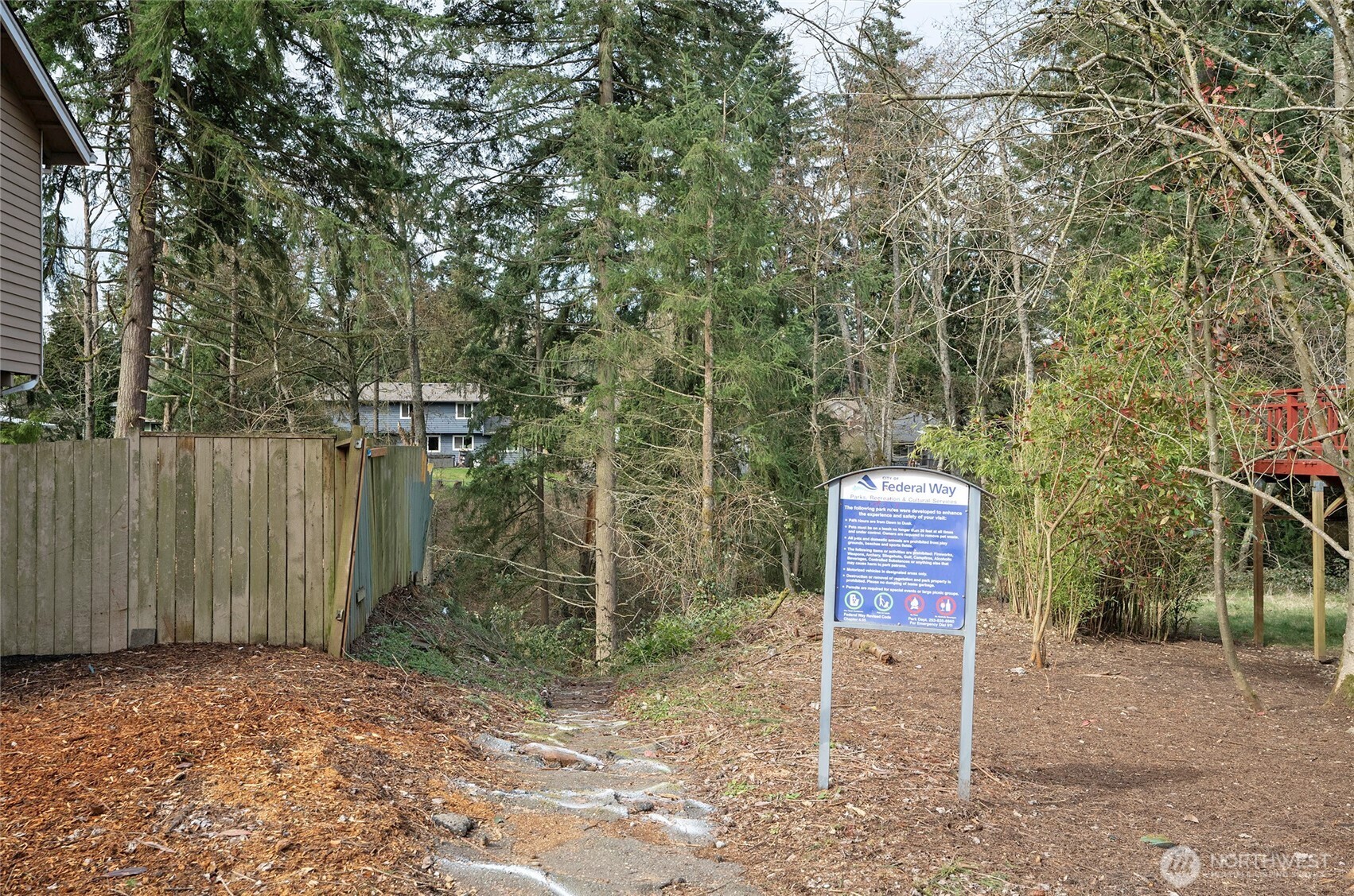 Just two doors down on the left, you'll find the trailhead—perfect for stretching your legs and enjoying the outdoors. Olympic View Park details   - 9.8 Acres  - Parking  - Picnic Area  - Playground Area  - Walking Trail