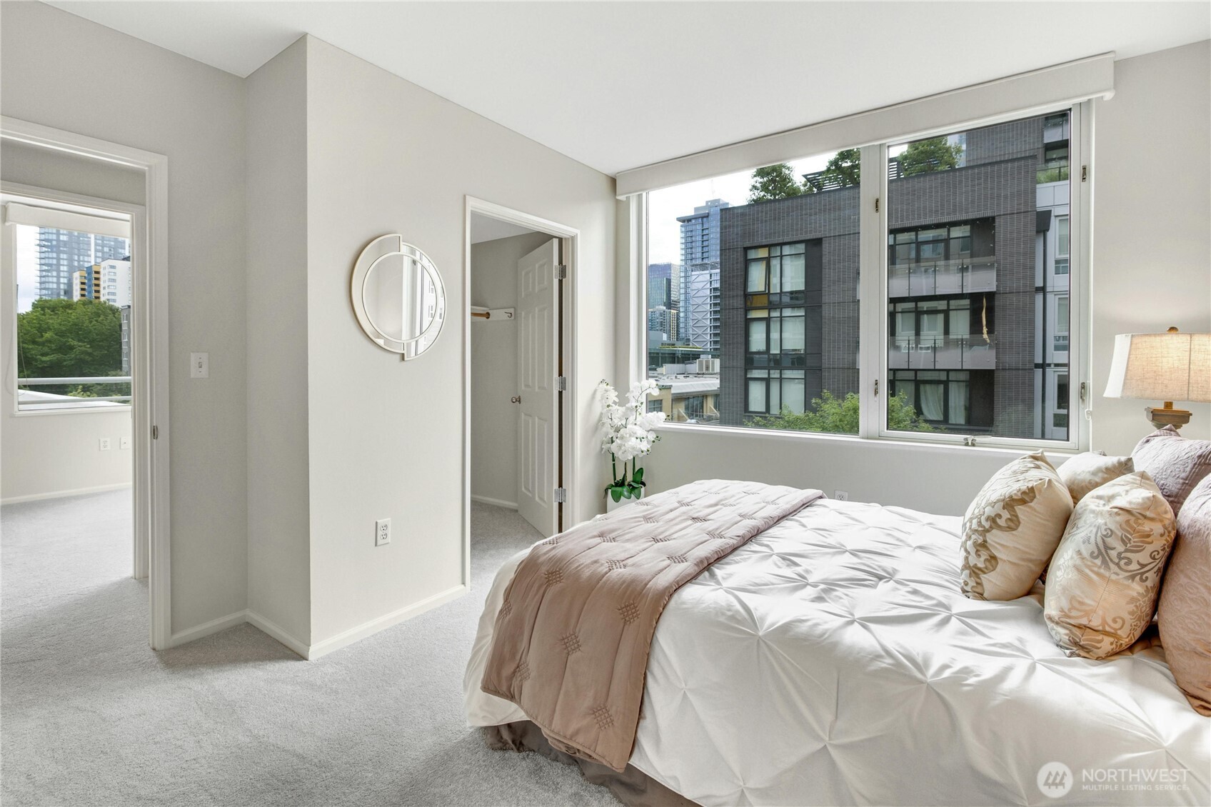 Primary bedroom with walk-in closet