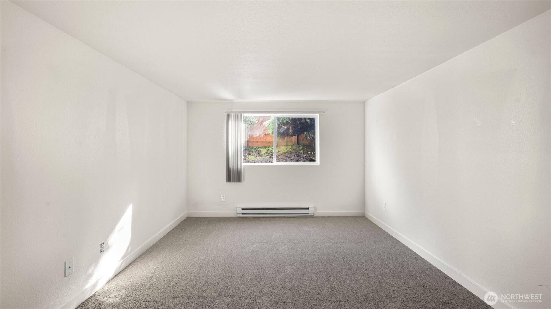Sizable guest bedroom.