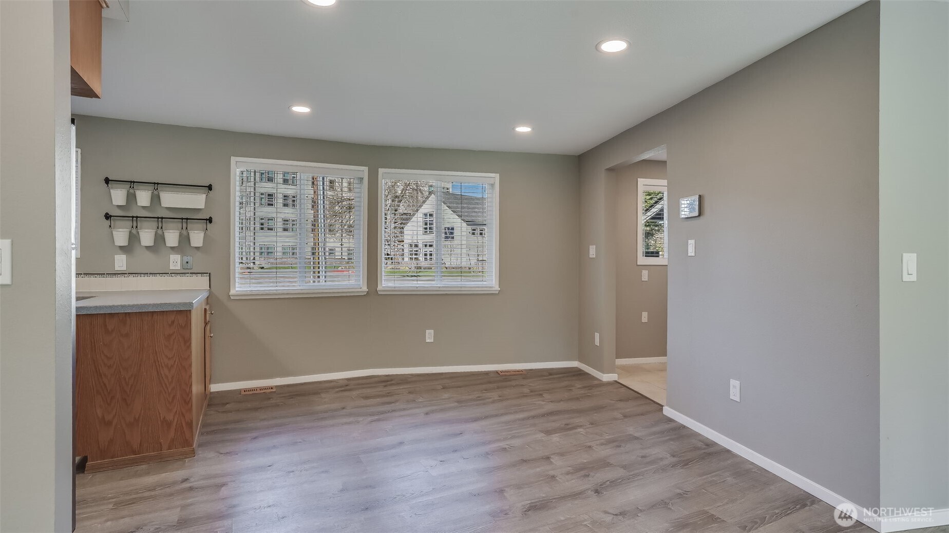 Spacious dining room just steps from the kitchen, for easy serving.