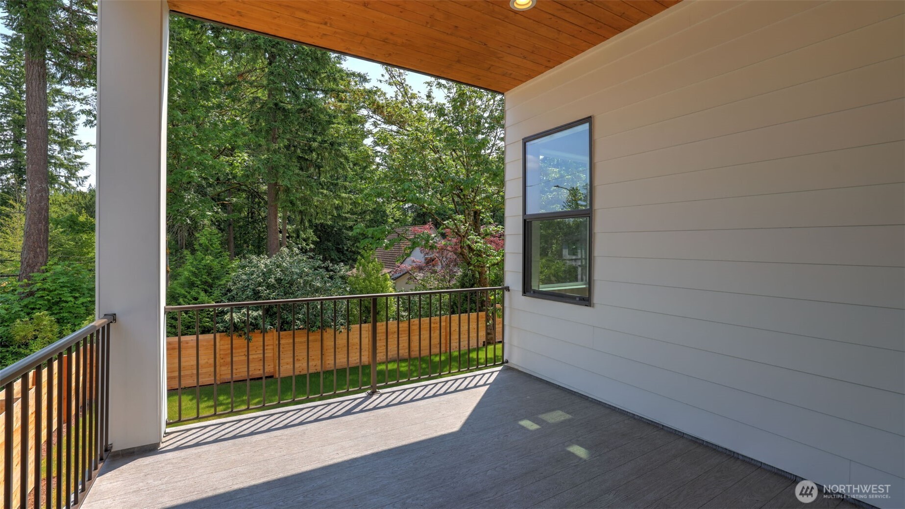 Covered deck is ideal for year-round enjoyment!