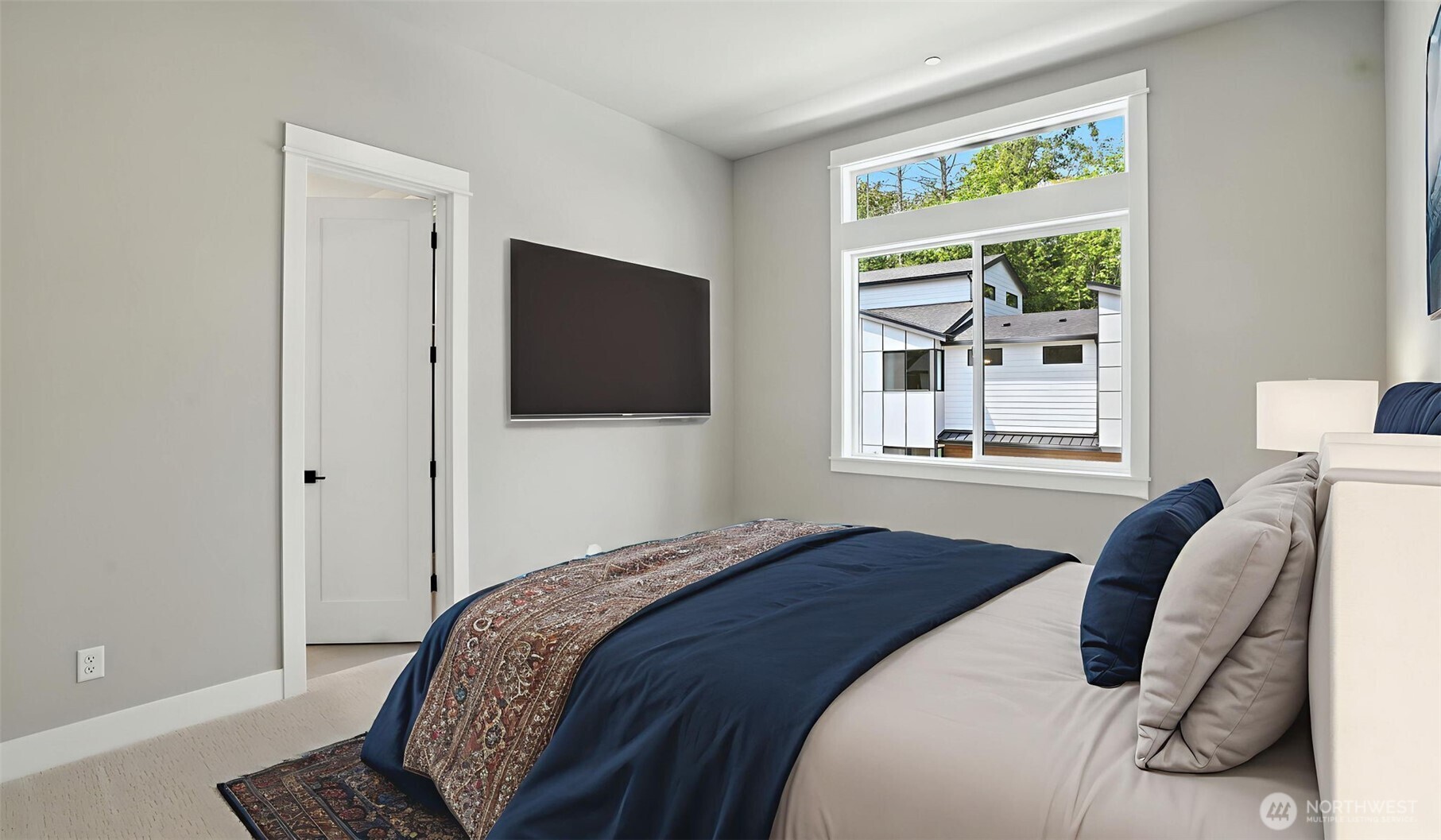 3rd of four bedrooms on the Upper Level. This one shares a Jack-and-Jill Bathroom with the 4th Bedroom. Virtually staged.