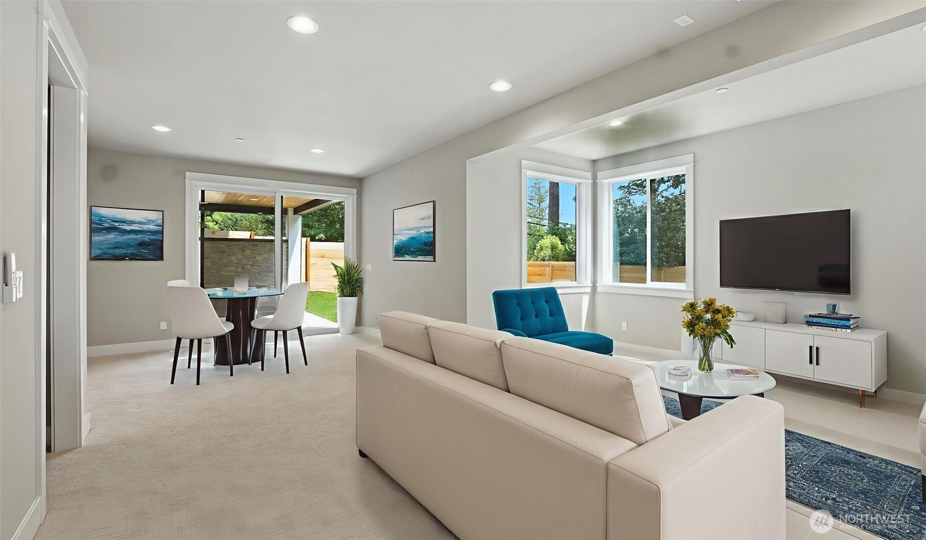 Lower Level Rec Room is pre-wired with 7.1 Surround Sound and for a projector. You're ready for game day or movie night! Virtually staged.