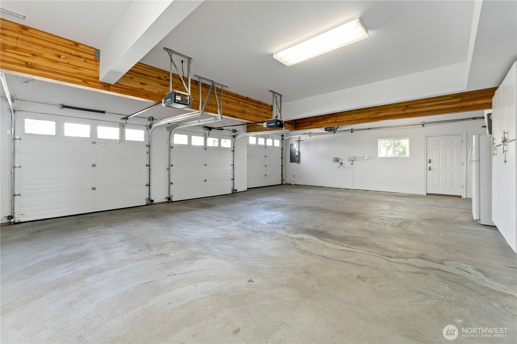 3 bay garage with boat bay.