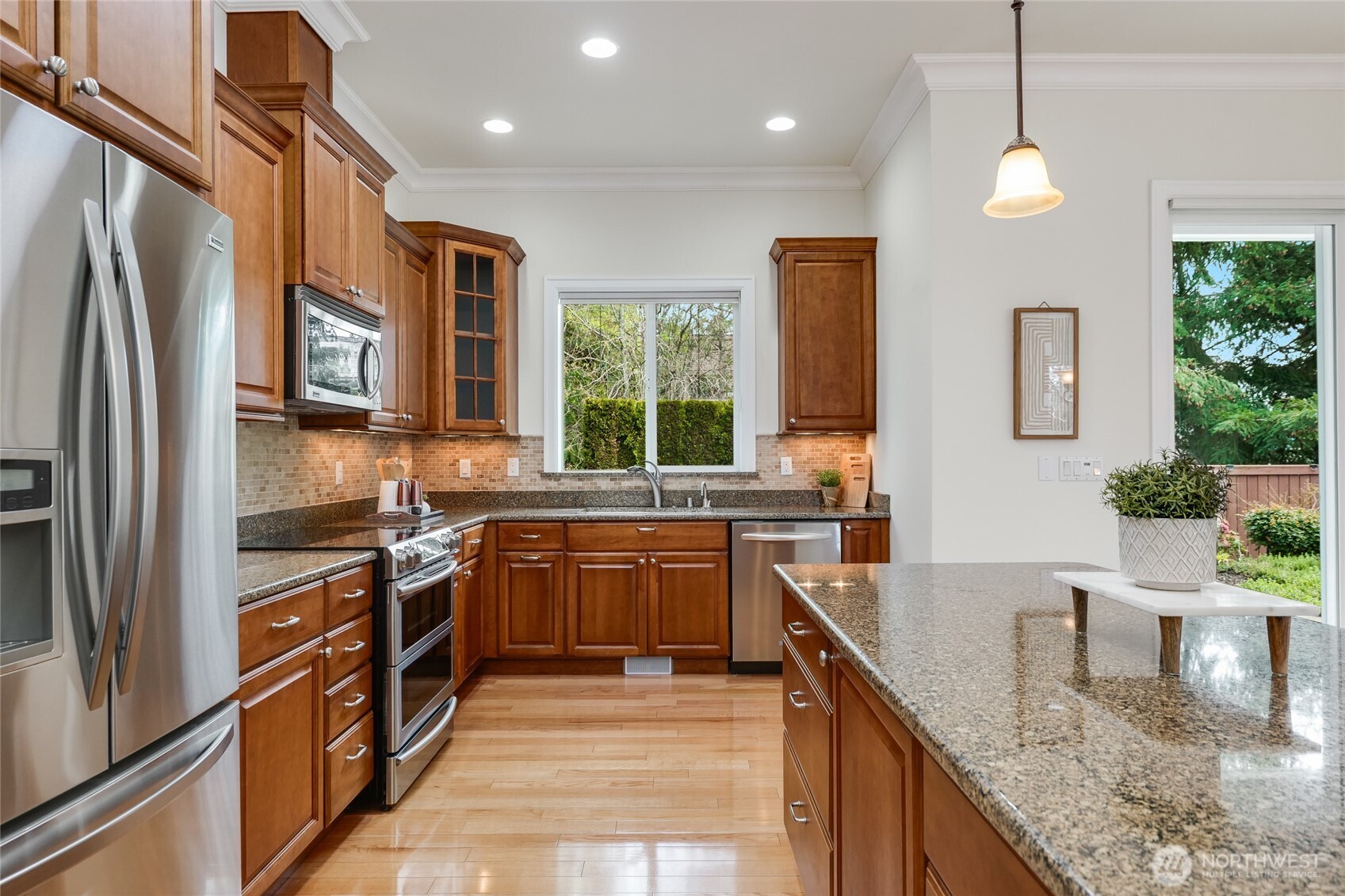 large kitchen, tons of storage and stainless steal appliances