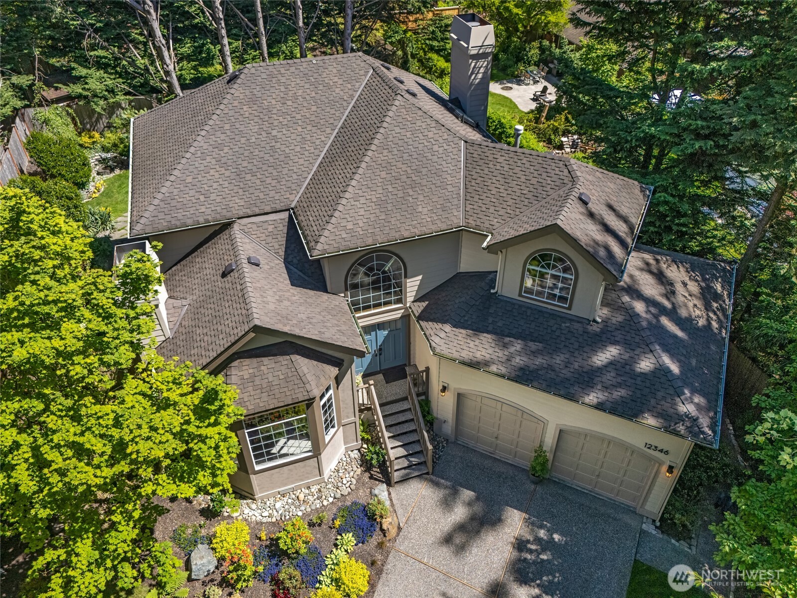 With a sunny, private backyard, and studio,