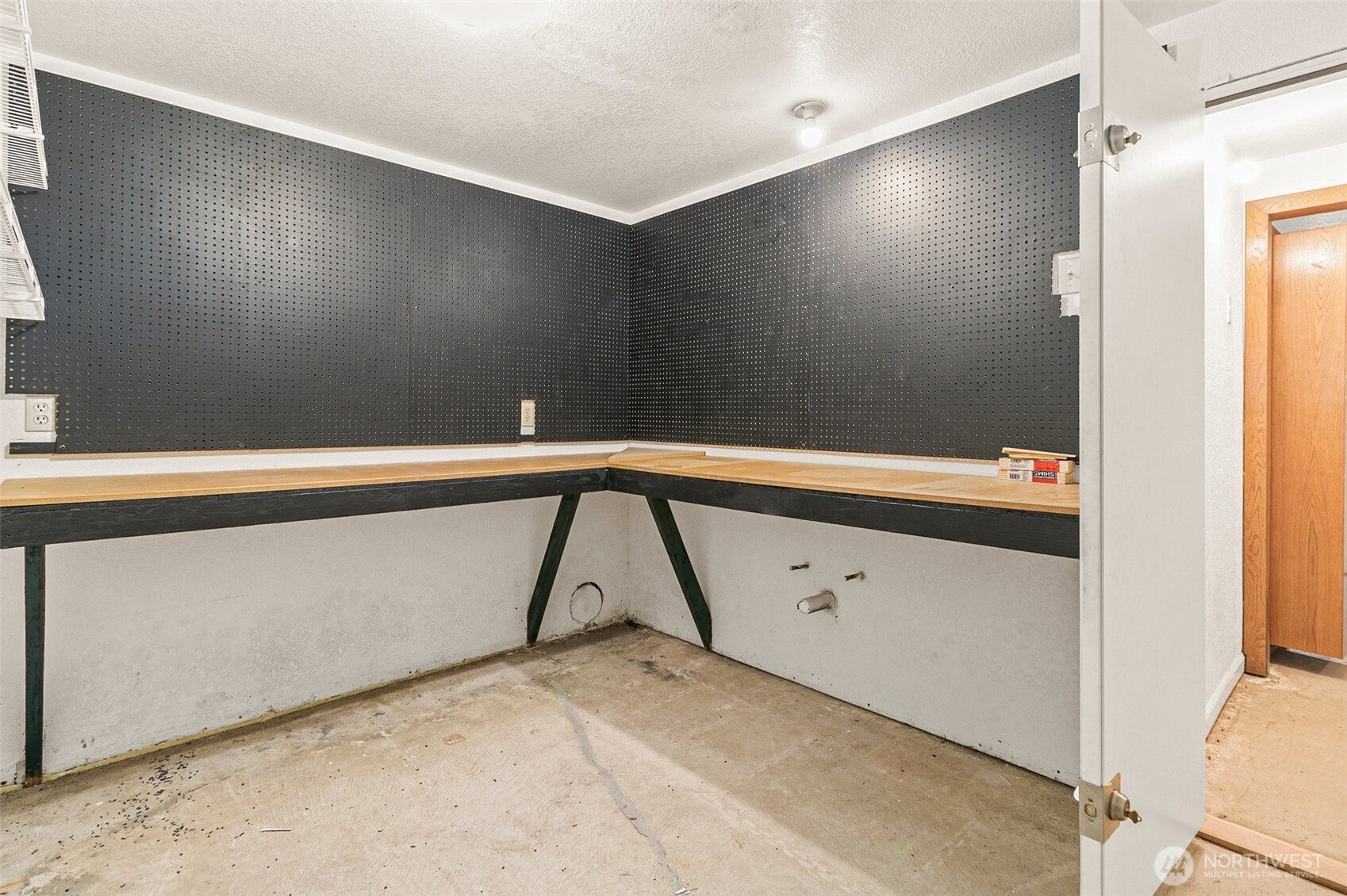 Hidden storage behind bookshelf