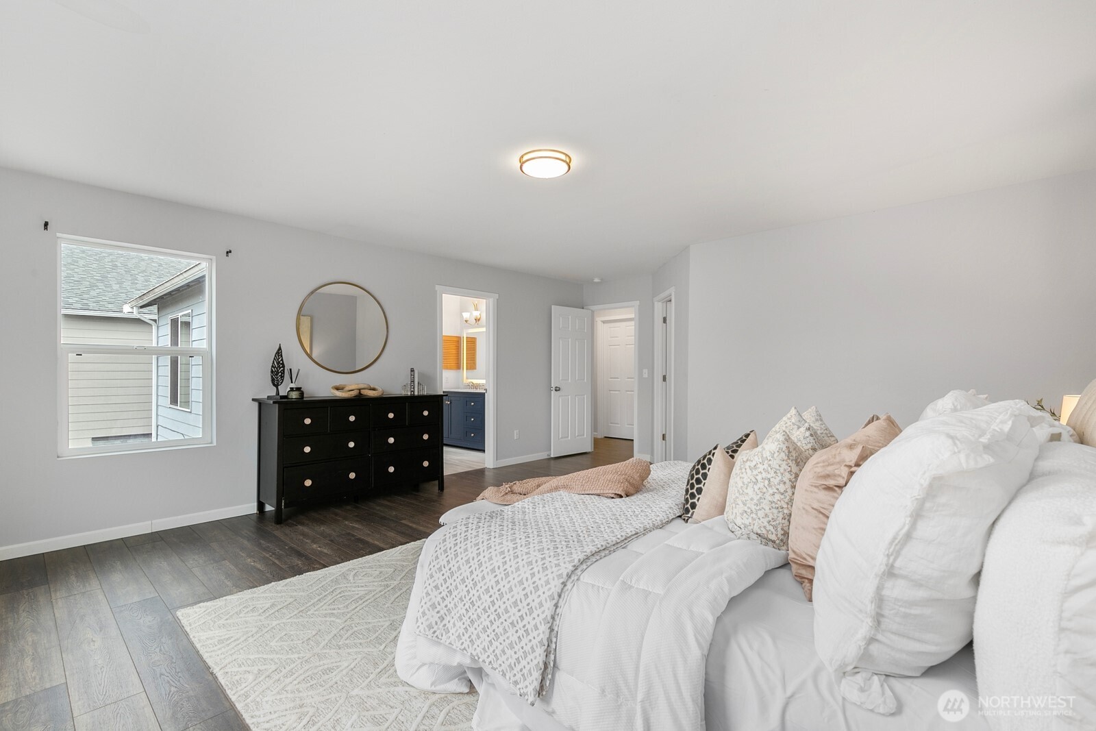 Luxuriously updated primary en suite was fully remodeled in 2022.