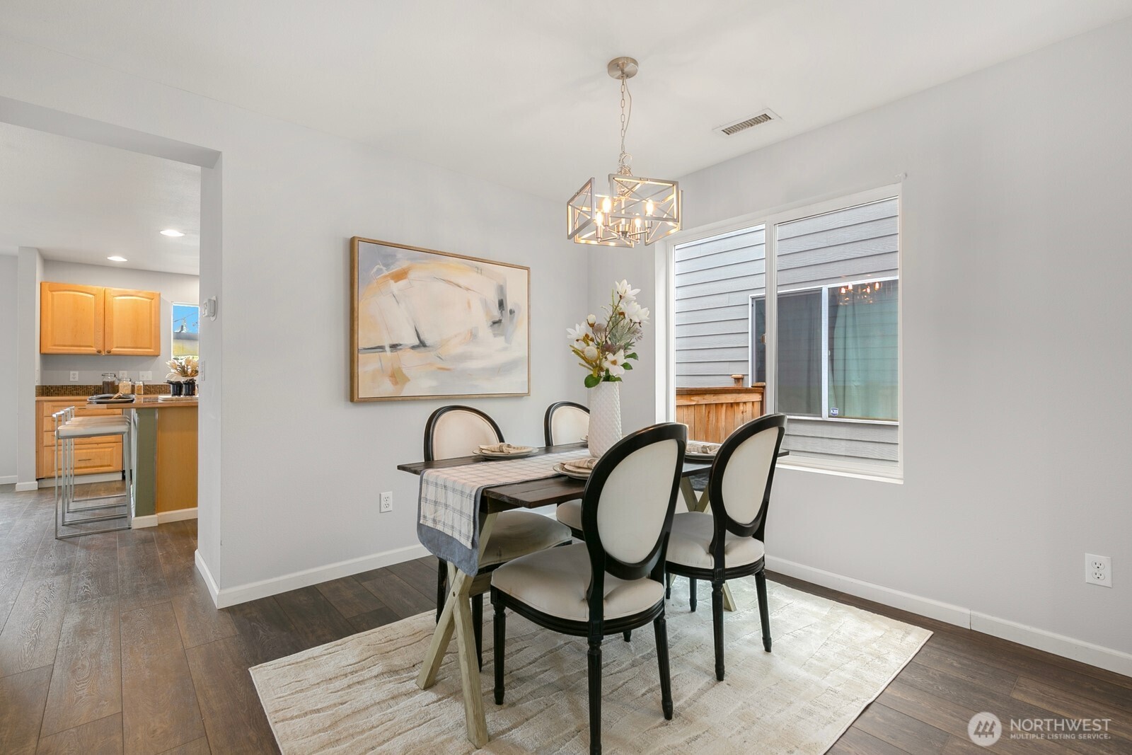 Kitchen sits just off dining area, making entertaining easy.