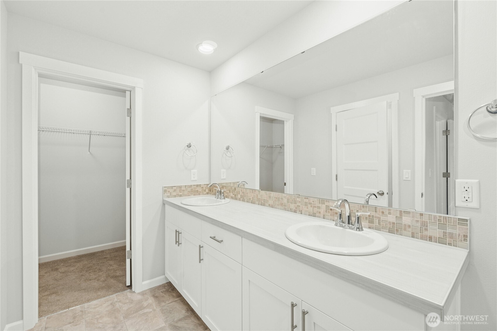 **Photos are of the same floorplan in another community. Specs, colors and features will vary**