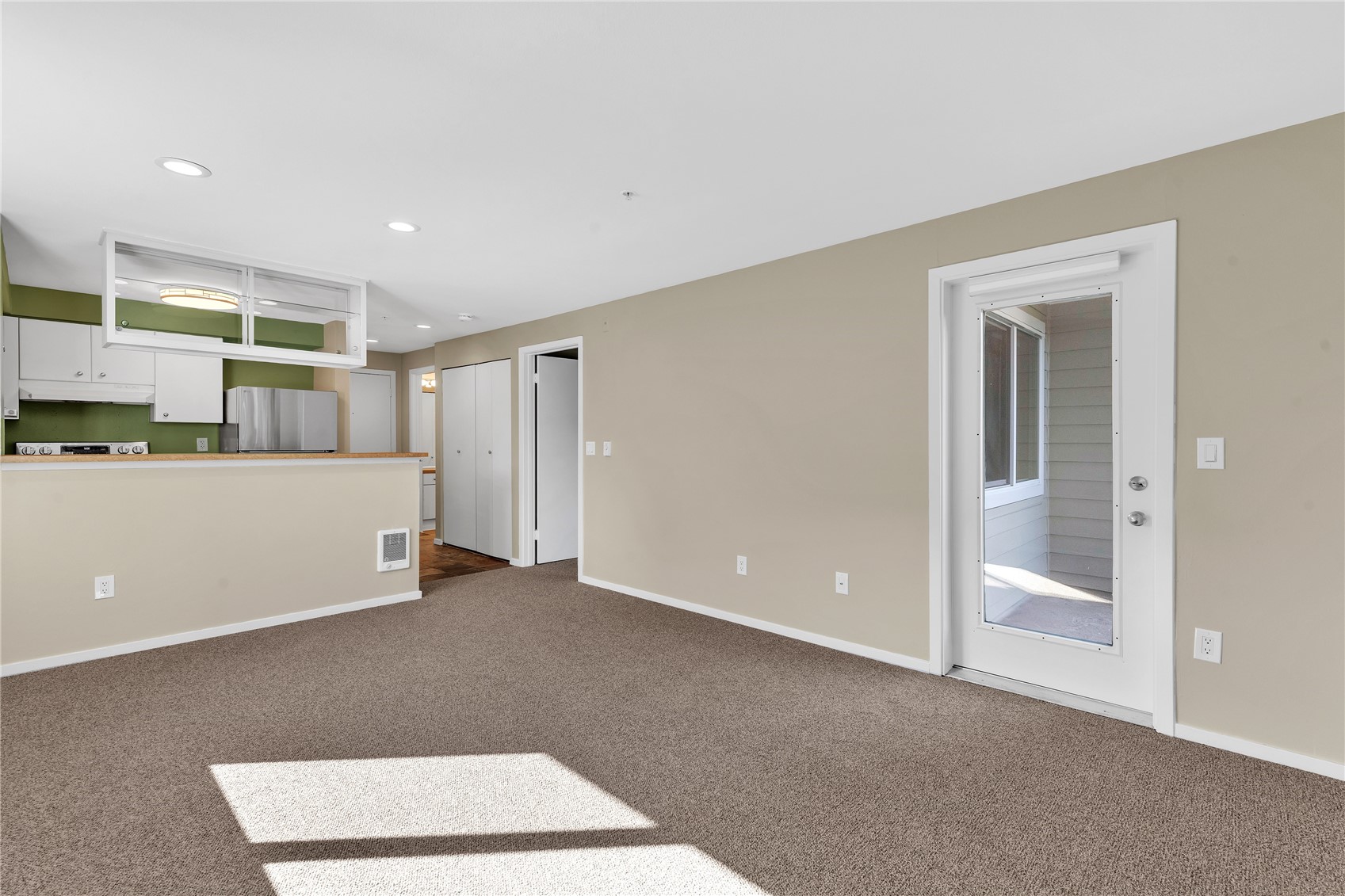 Door at Center to Bedroom