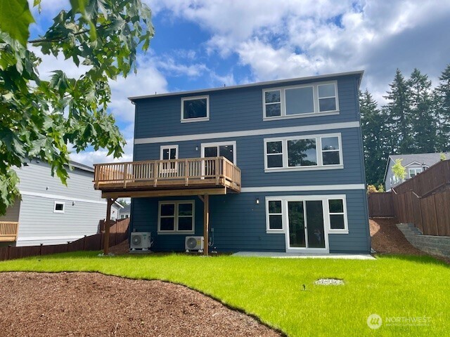 Photo is of actual home and yard under construction and for sale!