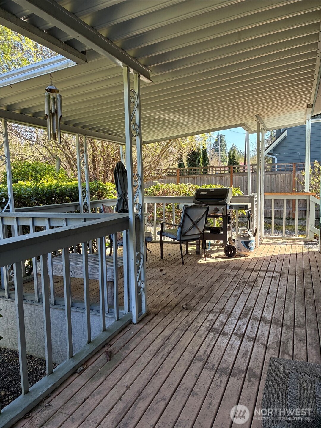 Covered Front Porch and Deck Eastward