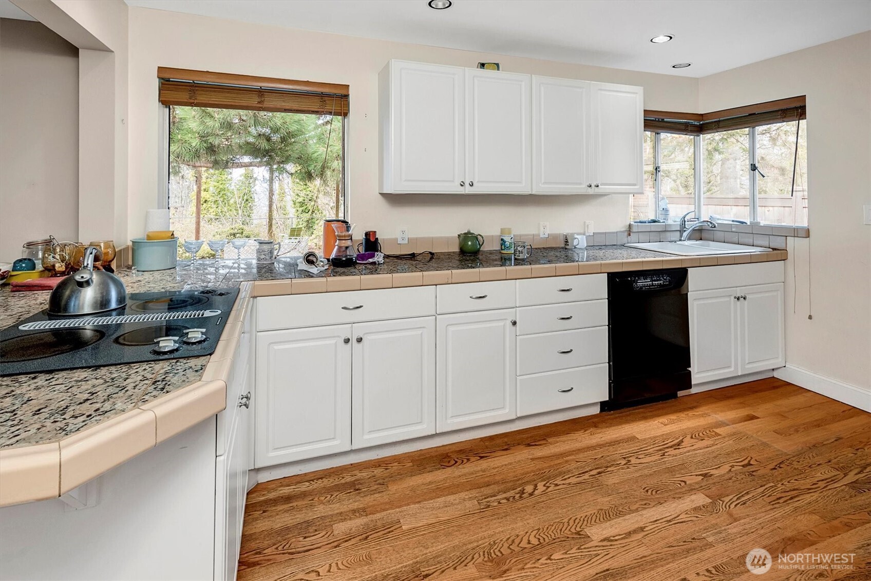 Kitchen admittedlyi needs updating; however ample room for modernization & chef's ktichen!
