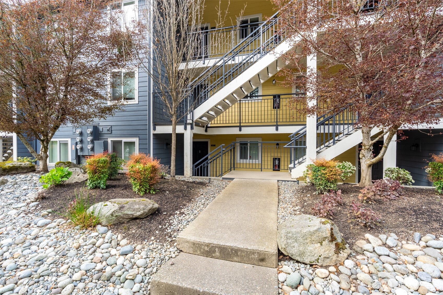 Tasteful landscaping surrounds the property.
