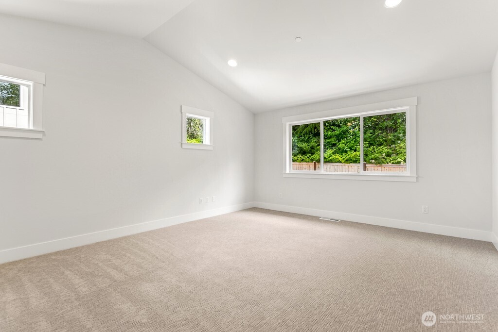 Spacious primary with ensuite. Vaulted ceilings and privacy in the back