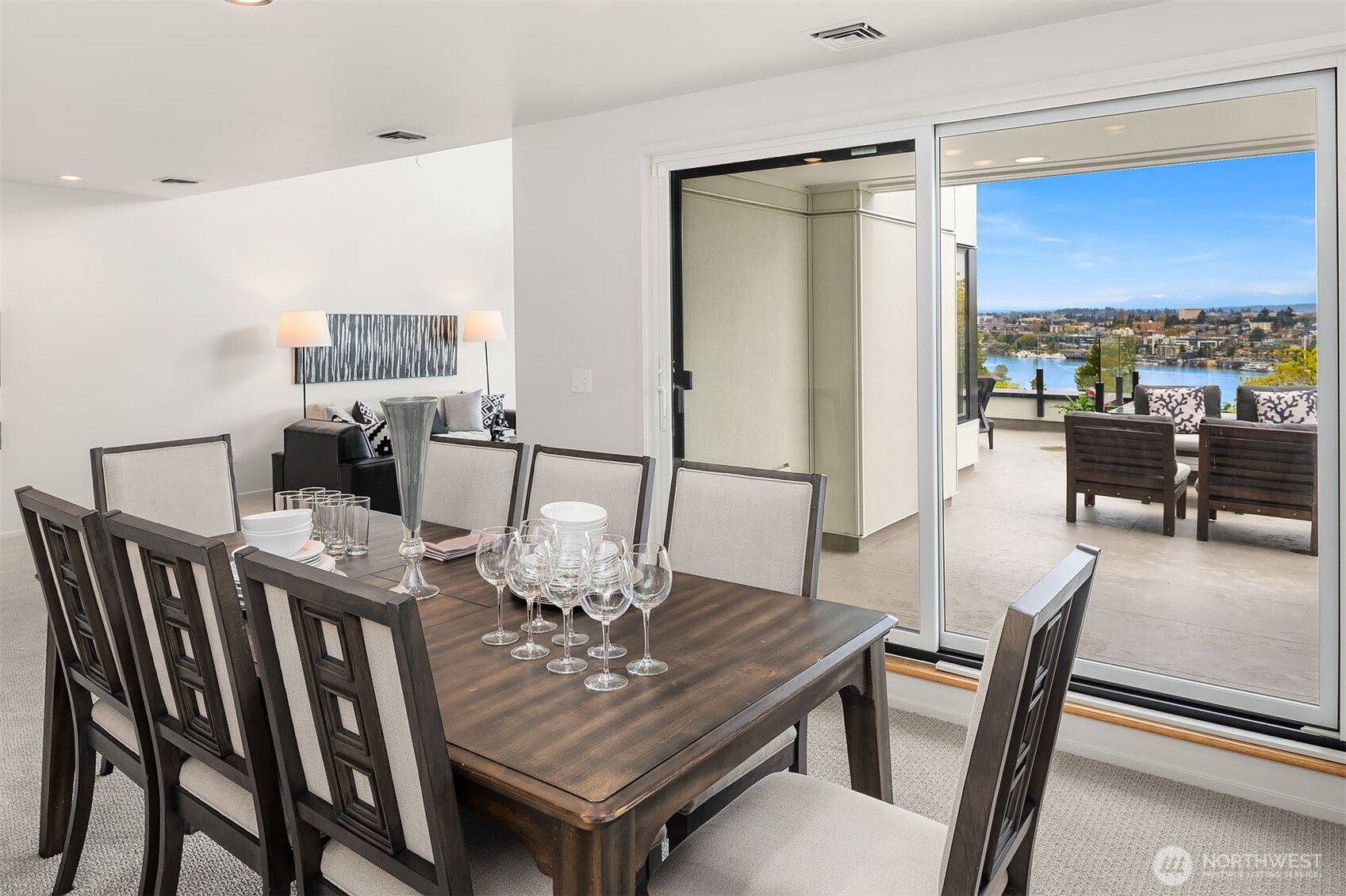 Open-concept flow creates a seamless indoor-outdoor dining experience.