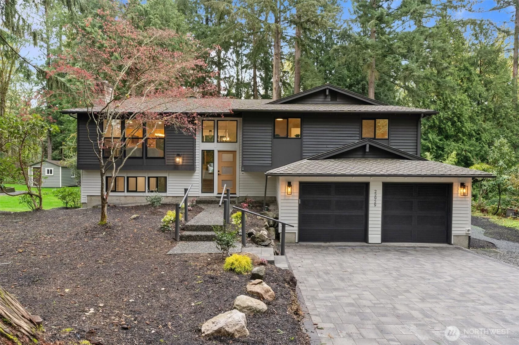 Amazing curb appeal with custom pavers and professional landscaping. Brand new features abound!