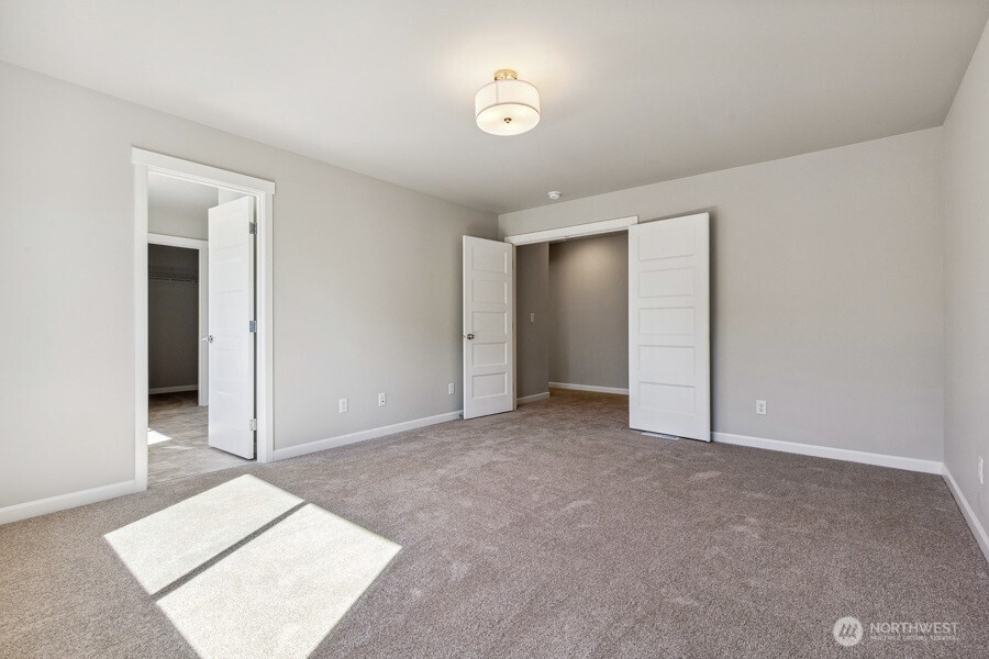 **Photos of simlar floorplan in another community. Features and specs will vary**