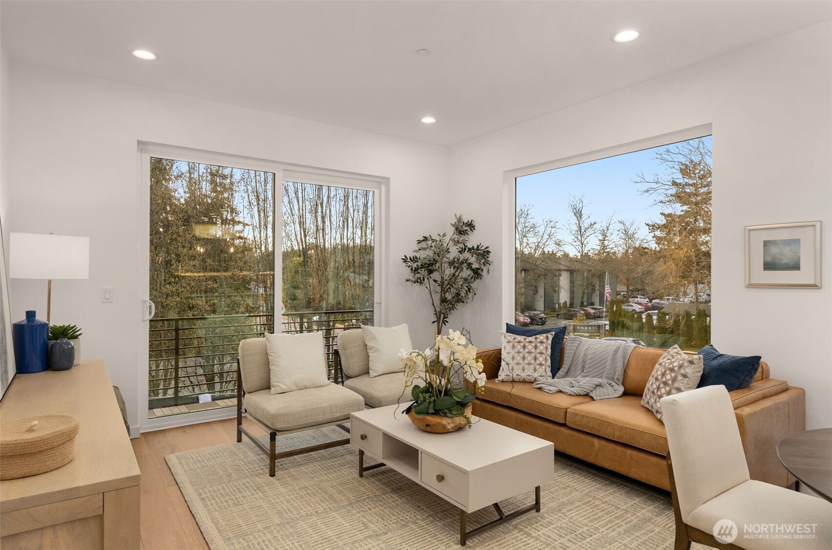 Open Concept Living Room with Expansive Windows.