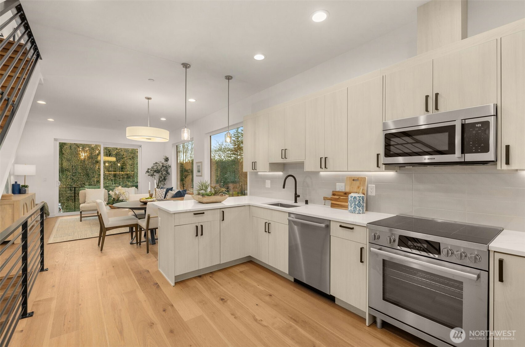 Engineered Hardwood Floors / Bosh Appliances / Designer Cabinets.