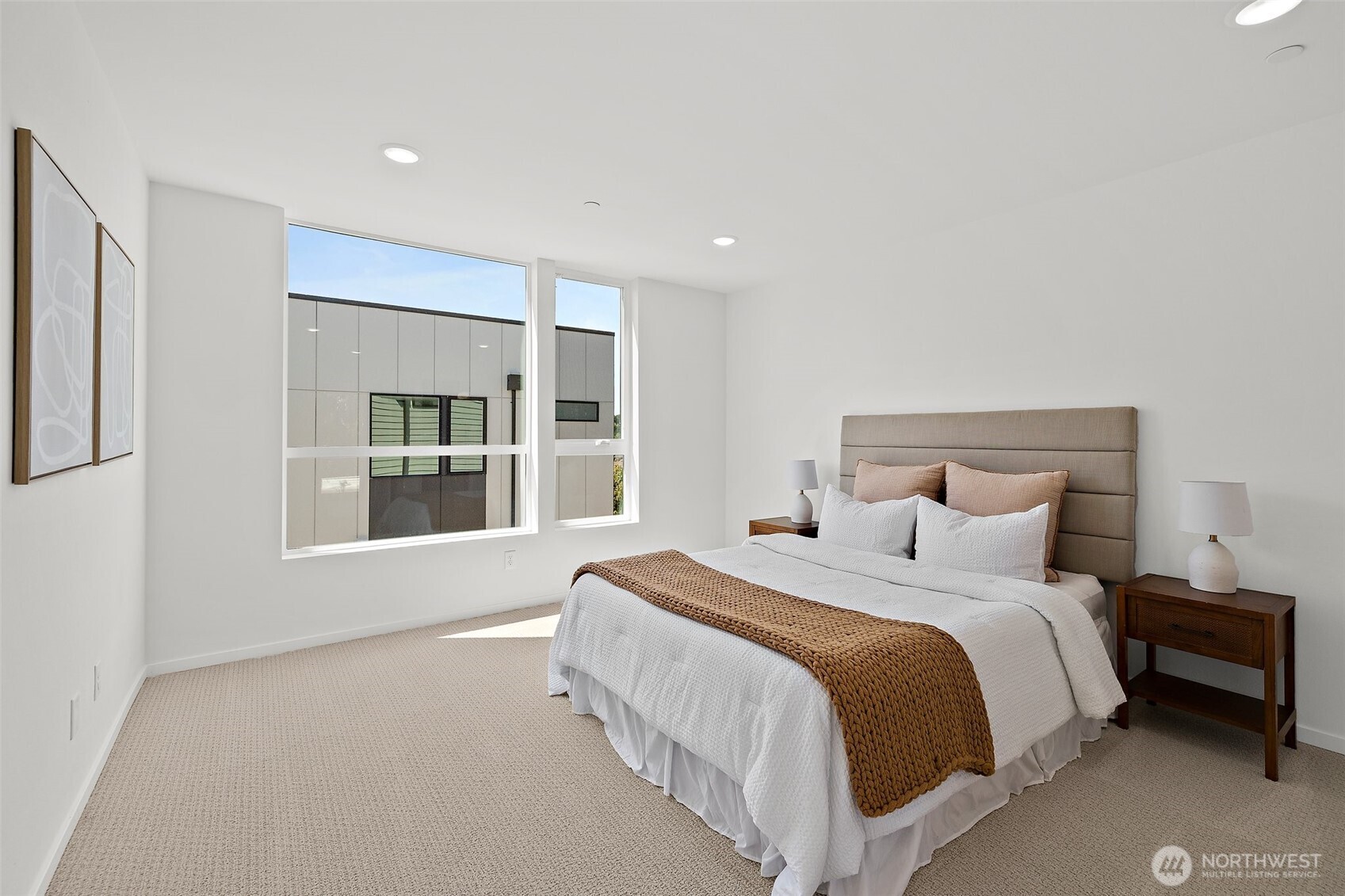 Another view of the spacious primary suite! Model home. Colors and finishes may vary.