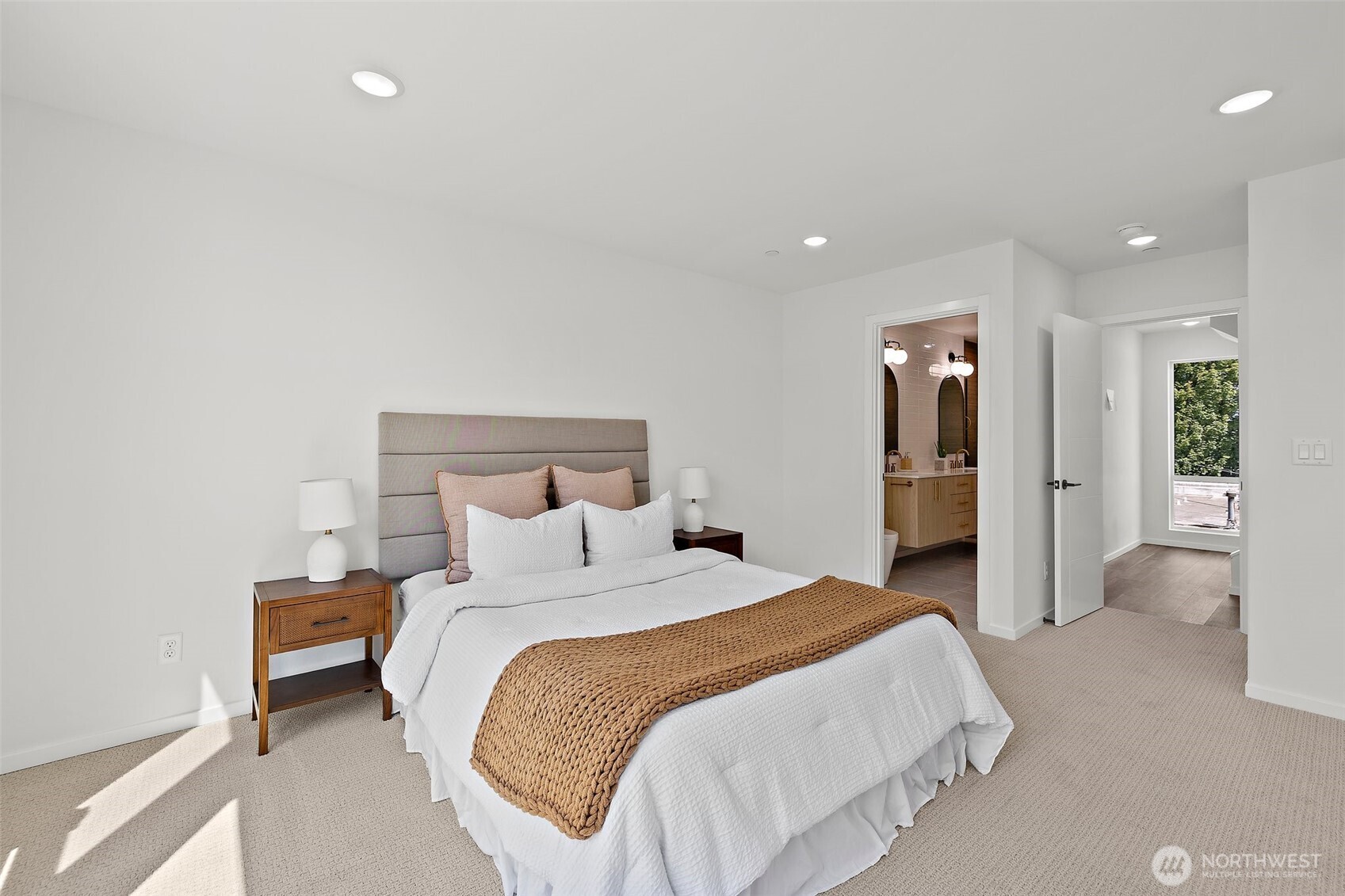 Primary bath with dual sinks! Model home. Colors and finishes may vary.