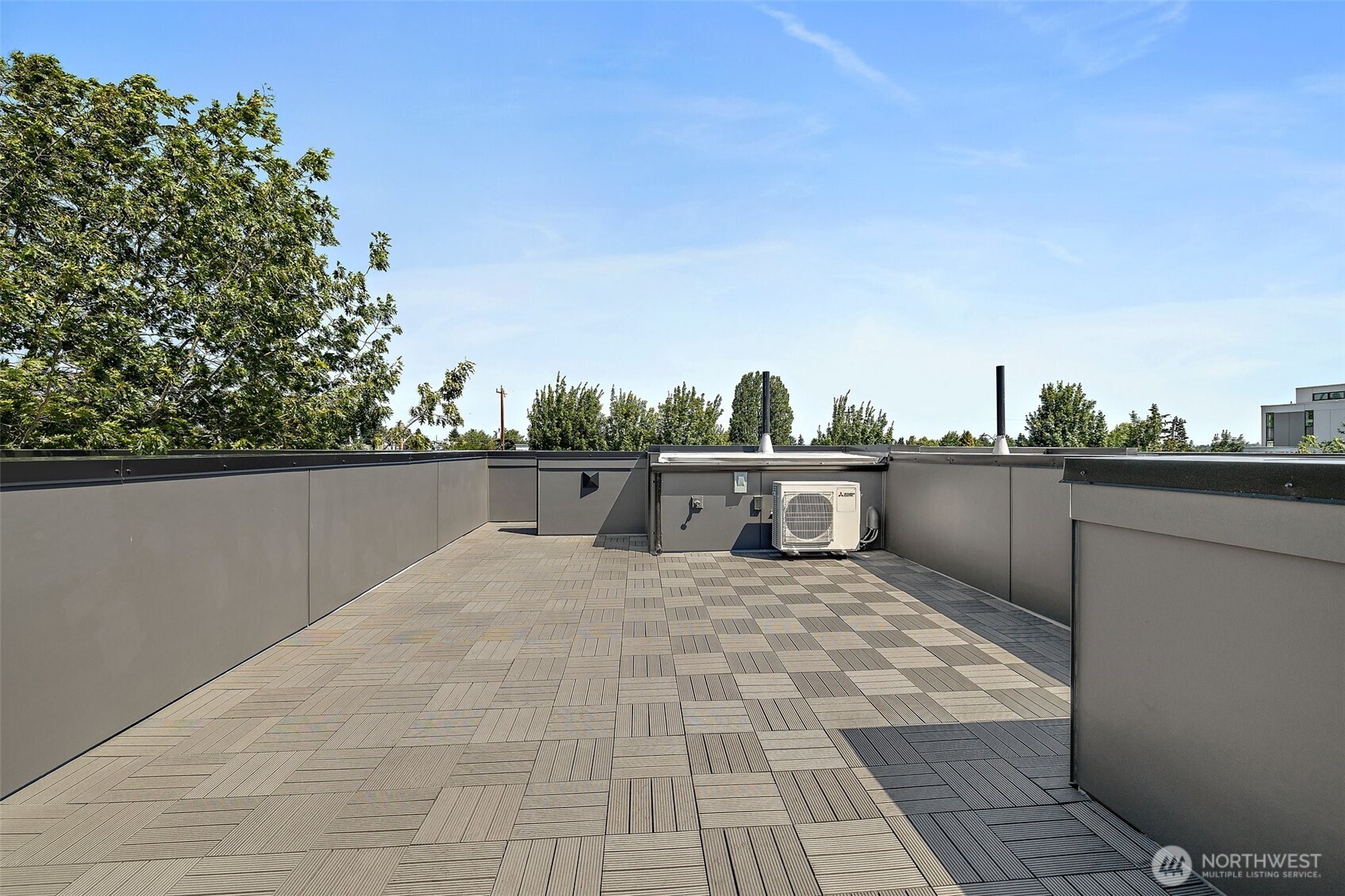 Lower level bedroom with access to back patio. Model home. Colors and finishes may vary.