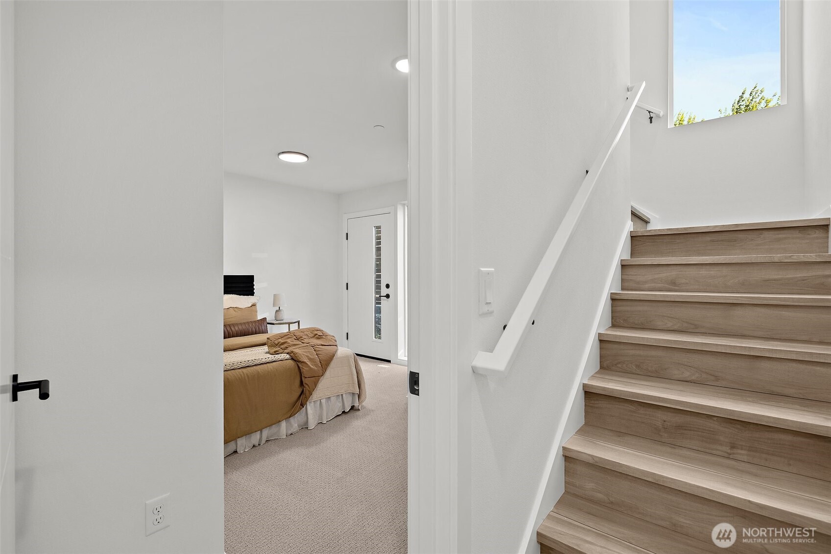 Great room with kitchen island! Model home. Colors and finishes may vary.