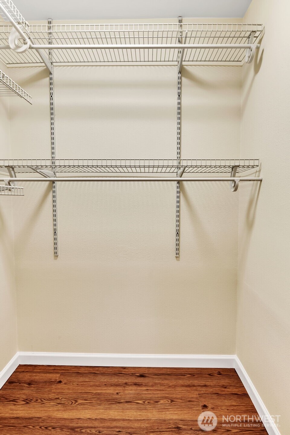 It's difficult to show in a photo the size of the walk-in-closet. Look at the floor plan for reference or come see for yourself!