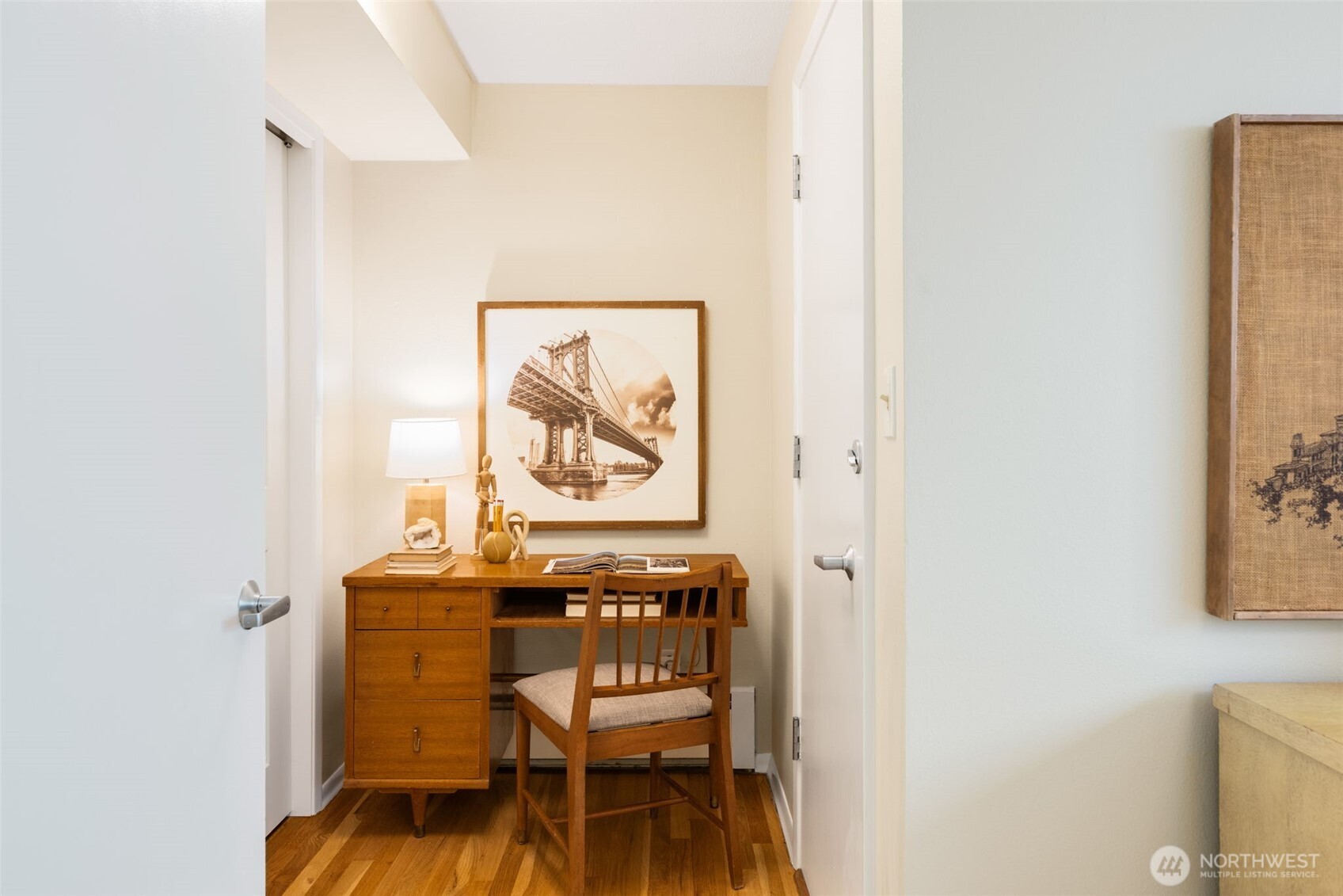 Bonus space. Lots of options. Back door to left, stairs down to yard and storage area.